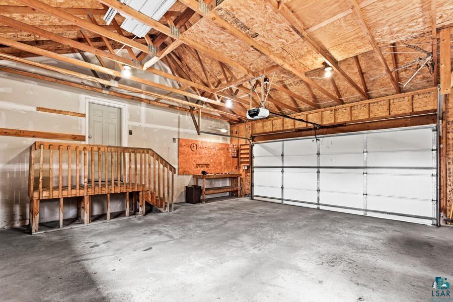 2020 East 11th Street Superior, WI 54880 - Photo 29 of 30 Garage featuring a garage door opener