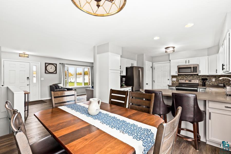 2020 East 11th Street Superior, WI 54880 - Photo 7 of 30 Dining area featuring dark wood-type flooring and recessed lighting