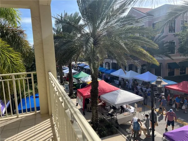 a view of a chairs and tables in patio