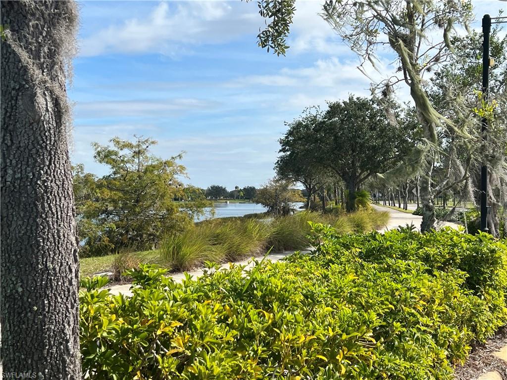 5068 Annunciation Circle, Unit 4211 Ave Maria, FL 34142 - Photo 23 of 23 Trail around the Rosary Lake