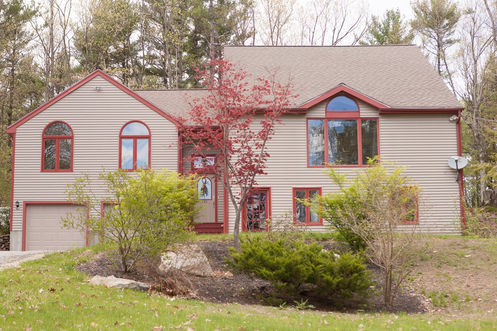 235 Ellis Road Westminster, MA 01473 - Photo 1 of 30 a front view of a house with garden