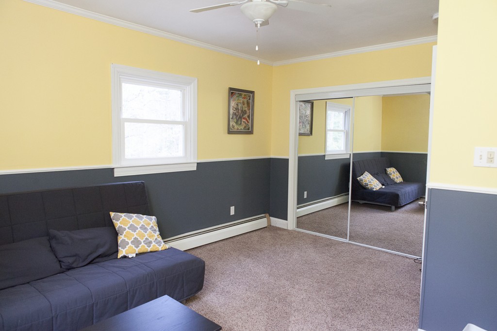 235 Ellis Road Westminster, MA 01473 - Photo 14 of 30 a living room with a couch and a window