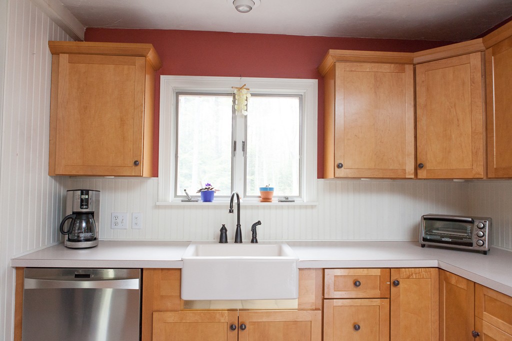 235 Ellis Road Westminster, MA 01473 - Photo 6 of 30 a kitchen with stainless steel appliances granite countertop a sink and a white cabinets
