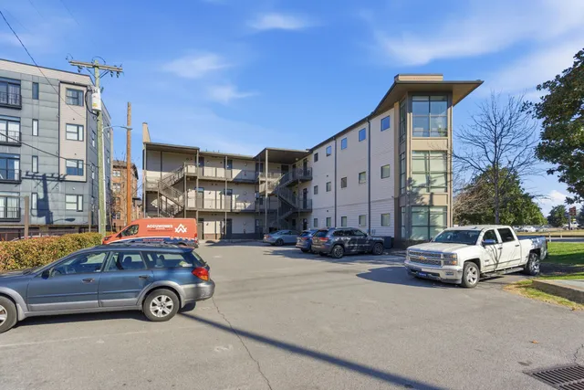 a car parked in front of a building