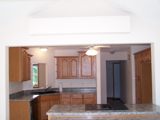 2380 Gustafson Road Belvidere, IL 61008 - Photo 5 of 11 a kitchen with a sink and a mirror