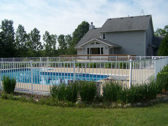 2380 Gustafson Road Belvidere, IL 61008 - Photo 9 of 11 a view of a house with a deck and a garden