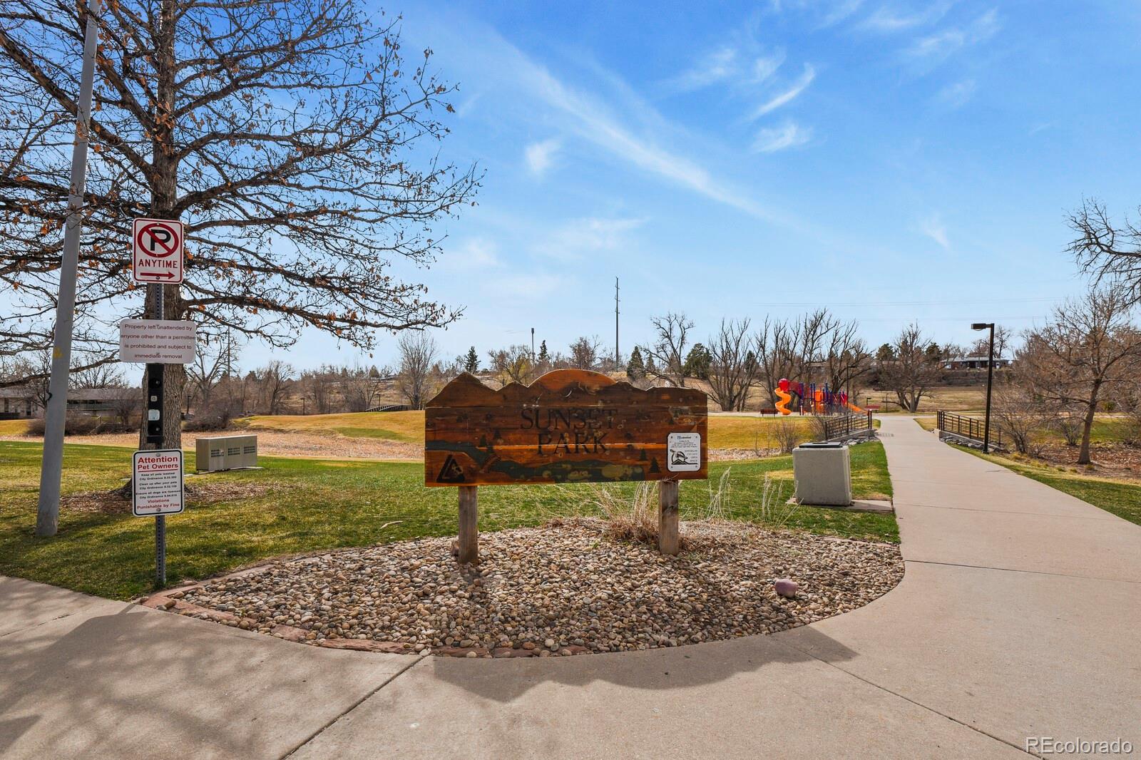 1078 Oak Circle Denver, CO 80215 - Photo 24 of 29 a view of a garden with lawn chairs
