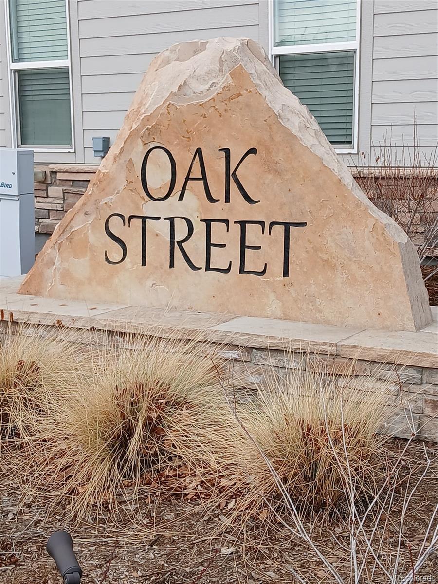 1078 Oak Circle Denver, CO 80215 - Photo 5 of 29 a sign that is on the side of a building