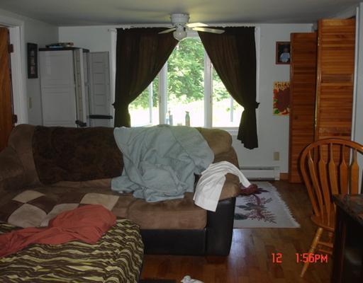 654 Shaw Hill Road Industry, ME 04938 - Photo 4 of 10 Living Room.