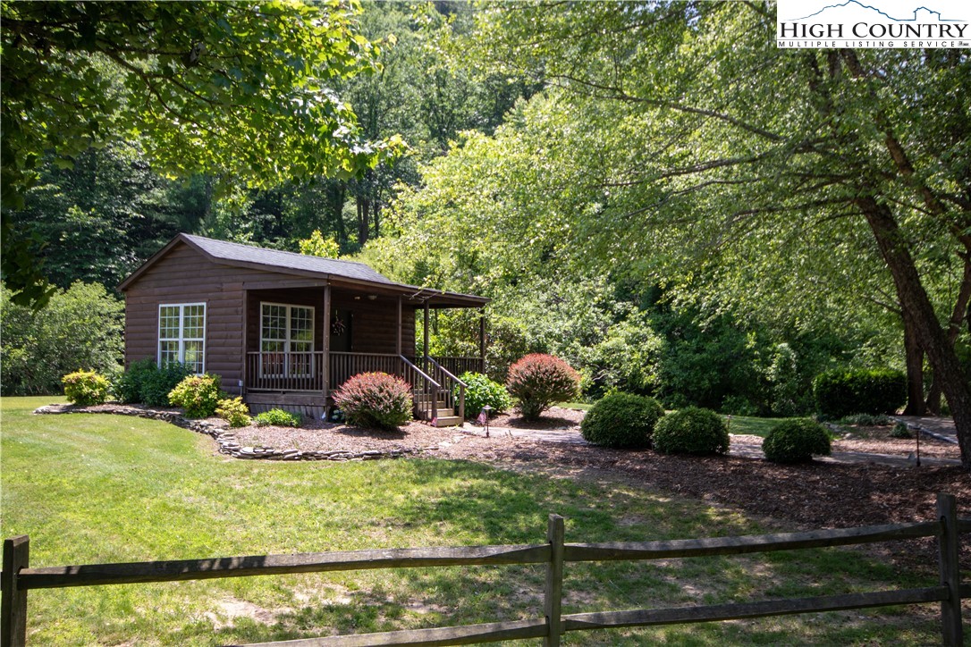 Lot#547 Autumn Ridge Drive Lenoir, NC 28645 - Photo 41 of 50 a front view of a house with garden