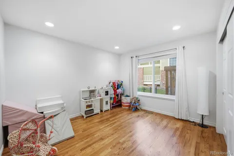a view of a room with toys and a window