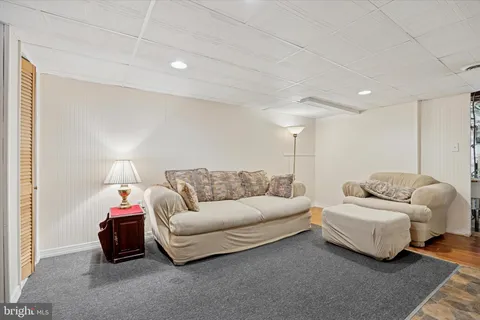 a living room with furniture and a couch