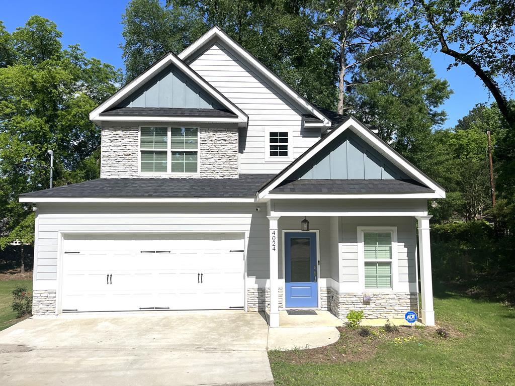 4024 Valley Road Columbus, GA 31907 - Photo 2 of 35 a front view of a house with a yard