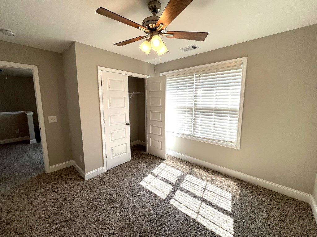 4024 Valley Road Columbus, GA 31907 - Photo 32 of 35 a view of livingroom with window and a ceiling fan