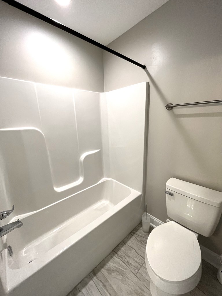 4024 Valley Road Columbus, GA 31907 - Photo 35 of 35 a bathroom with a toilet and a bathtub