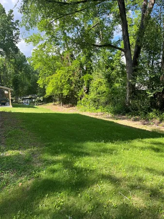 a view of a golf course with a yard
