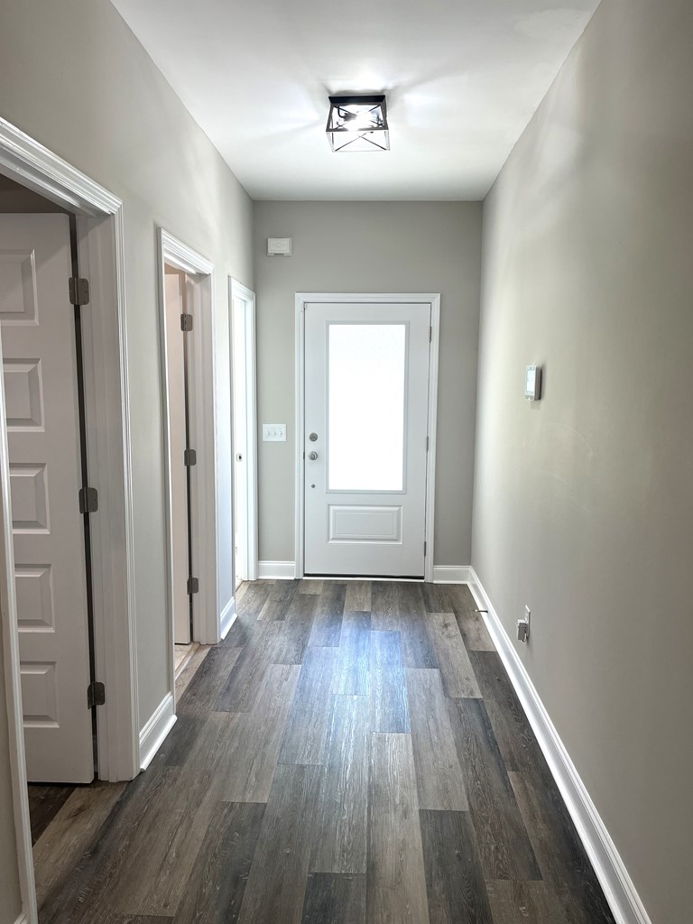 4024 Valley Road Columbus, GA 31907 - Photo 9 of 35 wooden floor in an empty room with a window