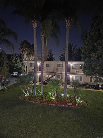 a garden view with a fountain