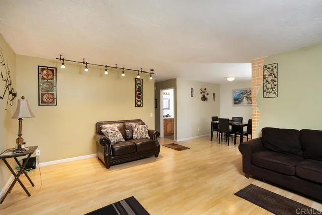 a living room with furniture and a couch