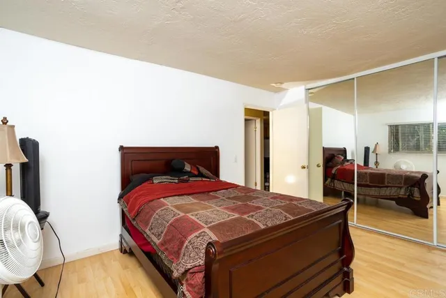 a bed room with a bed and a couch