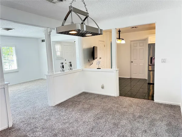 wooden floor in an empty room and a window