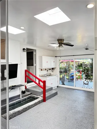 a view of a living room and hallway