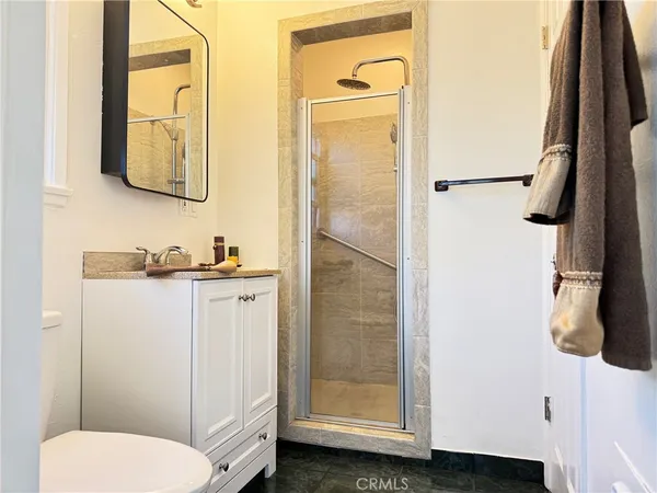 a view of a hallway with a white walls