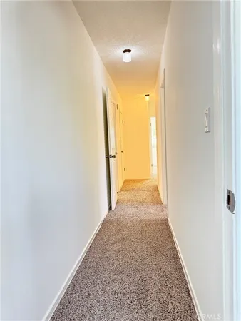 a view of a livingroom with wooden floor