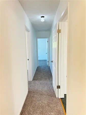 a view of hallway with window