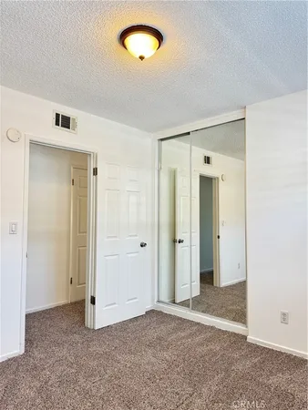 a outdoor living space with furniture and a potted plant