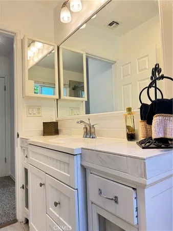 a view of swimming pool with a patio