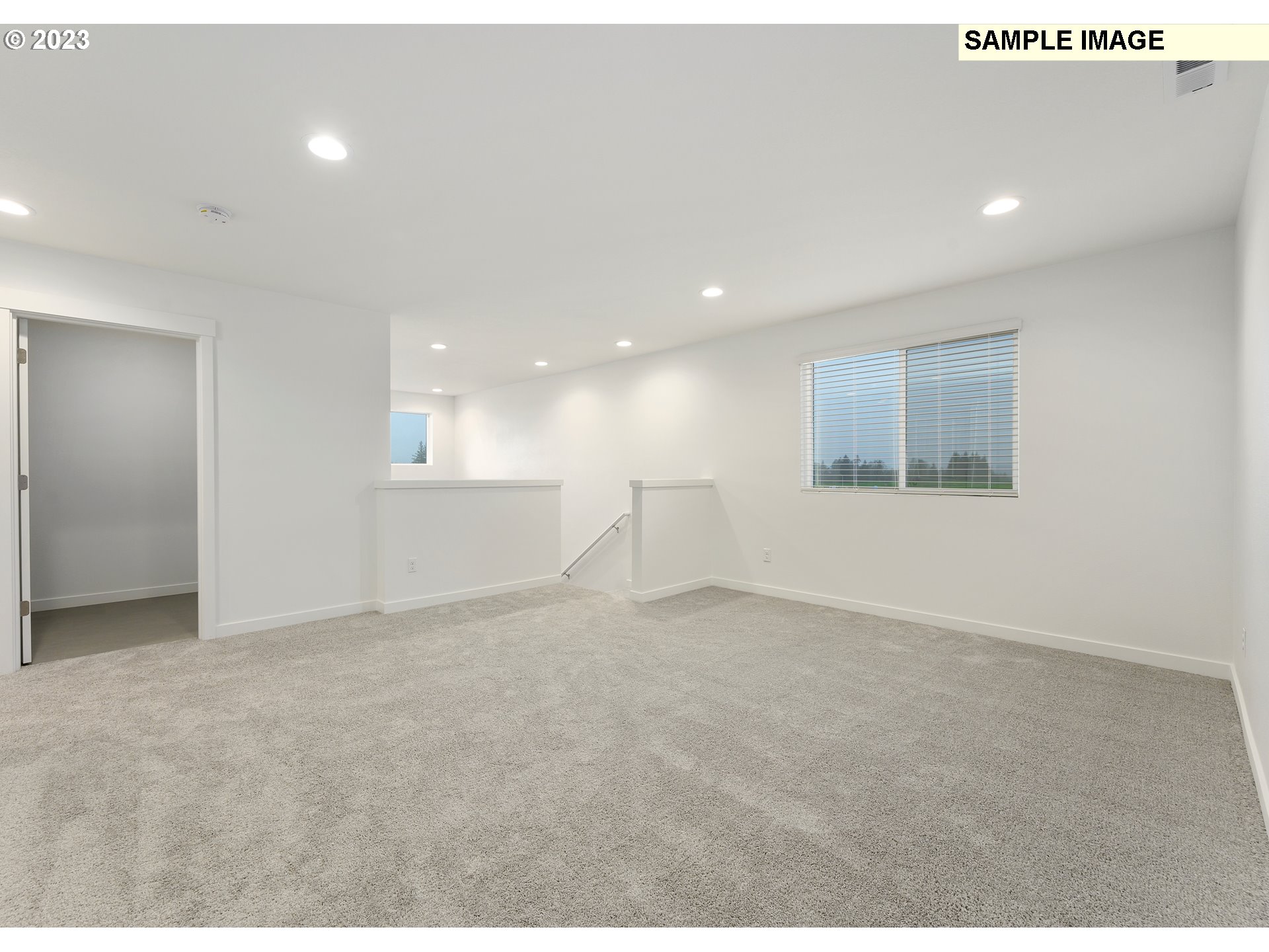 219 North 89th Loop, Unit 82 Ridgefield, WA 98642 - Photo 29 of 32 a view of an empty room with a window