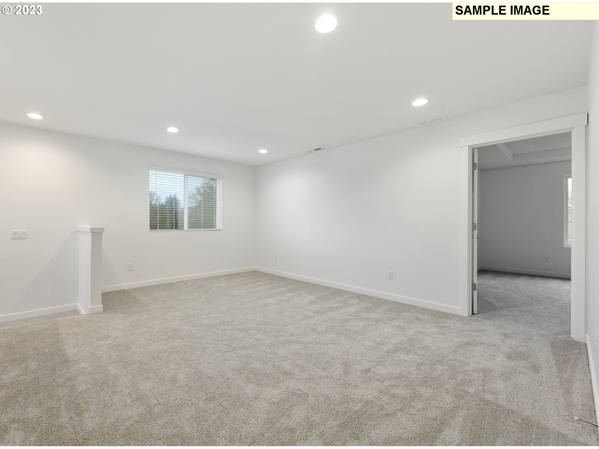 219 North 89th Loop, Unit 82 Ridgefield, WA 98642 - Photo 30 of 32 an empty room with windows