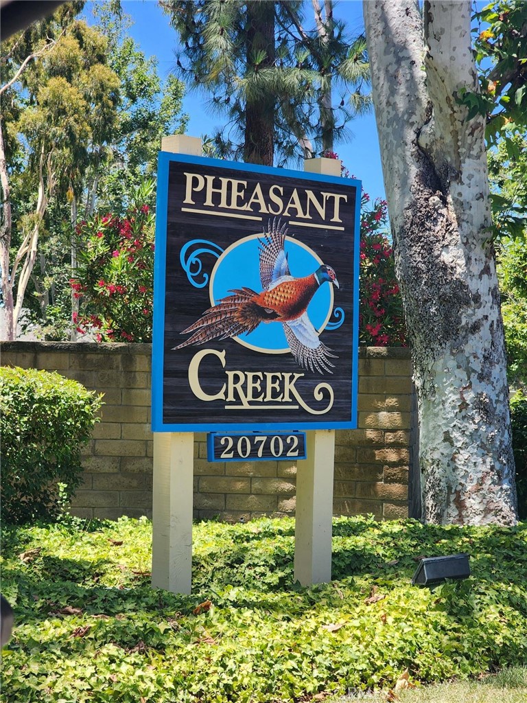 20702 El Toro Road, Unit 393 Lake Forest, CA 92630 - Photo 23 of 26 a sign that is on a pole