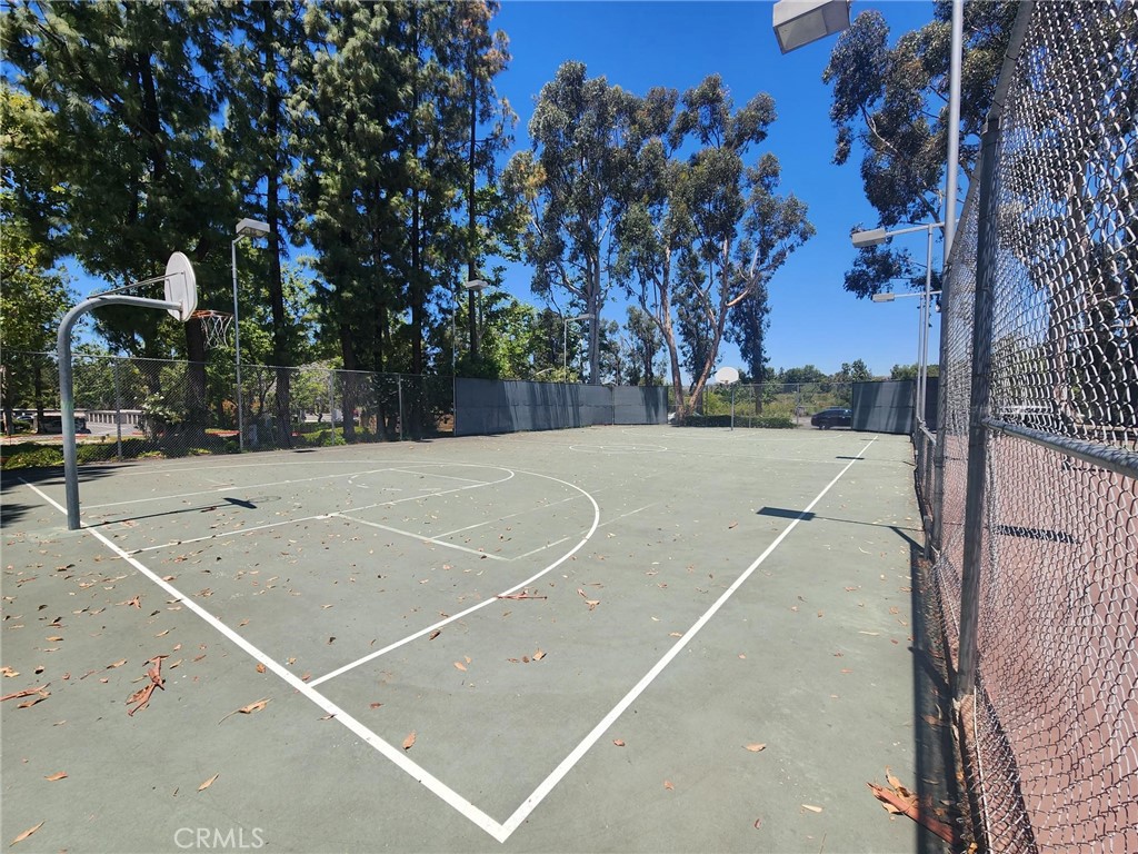 20702 El Toro Road, Unit 393 Lake Forest, CA 92630 - Photo 24 of 26 a view of a tennis court