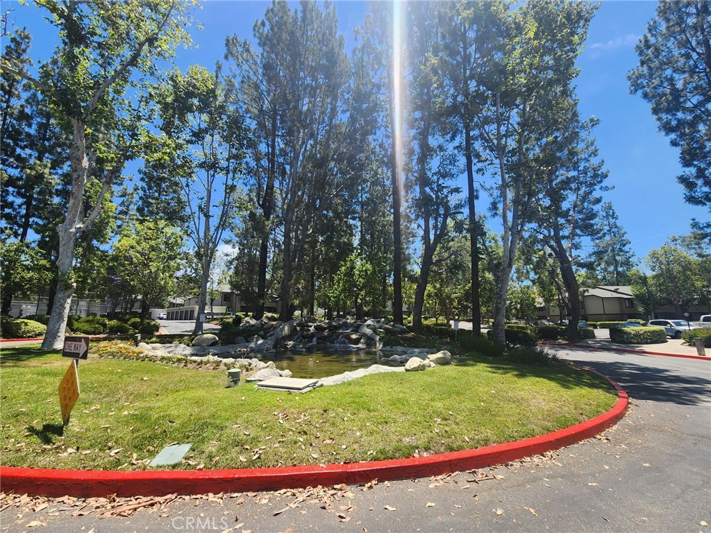 20702 El Toro Road, Unit 393 Lake Forest, CA 92630 - Photo 26 of 26 a view of a playground with basketball court