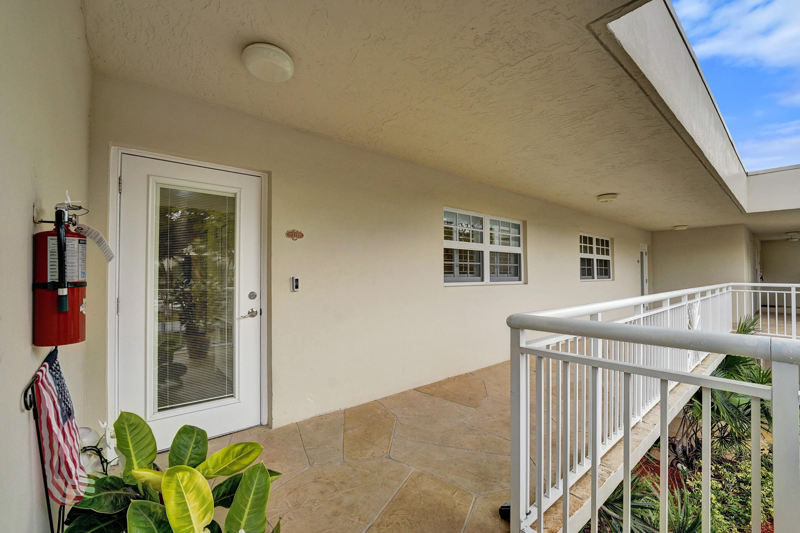 3145 Northeast 48th Court, Unit 215 Lighthouse Point, FL 33064 - Photo 29 of 46 Front door #1 215