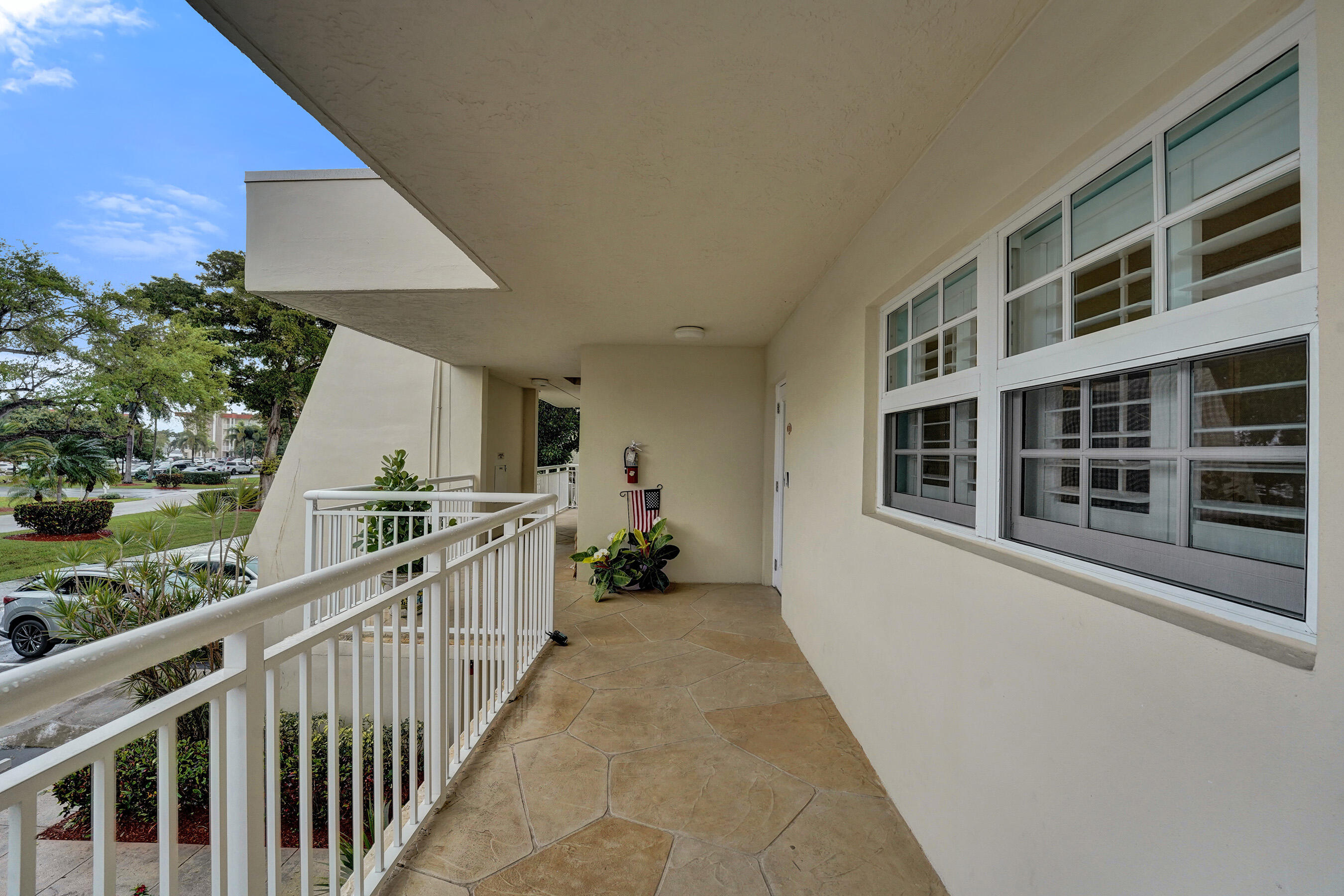 3145 Northeast 48th Court, Unit 215 Lighthouse Point, FL 33064 - Photo 30 of 46 Front balcony #1 215