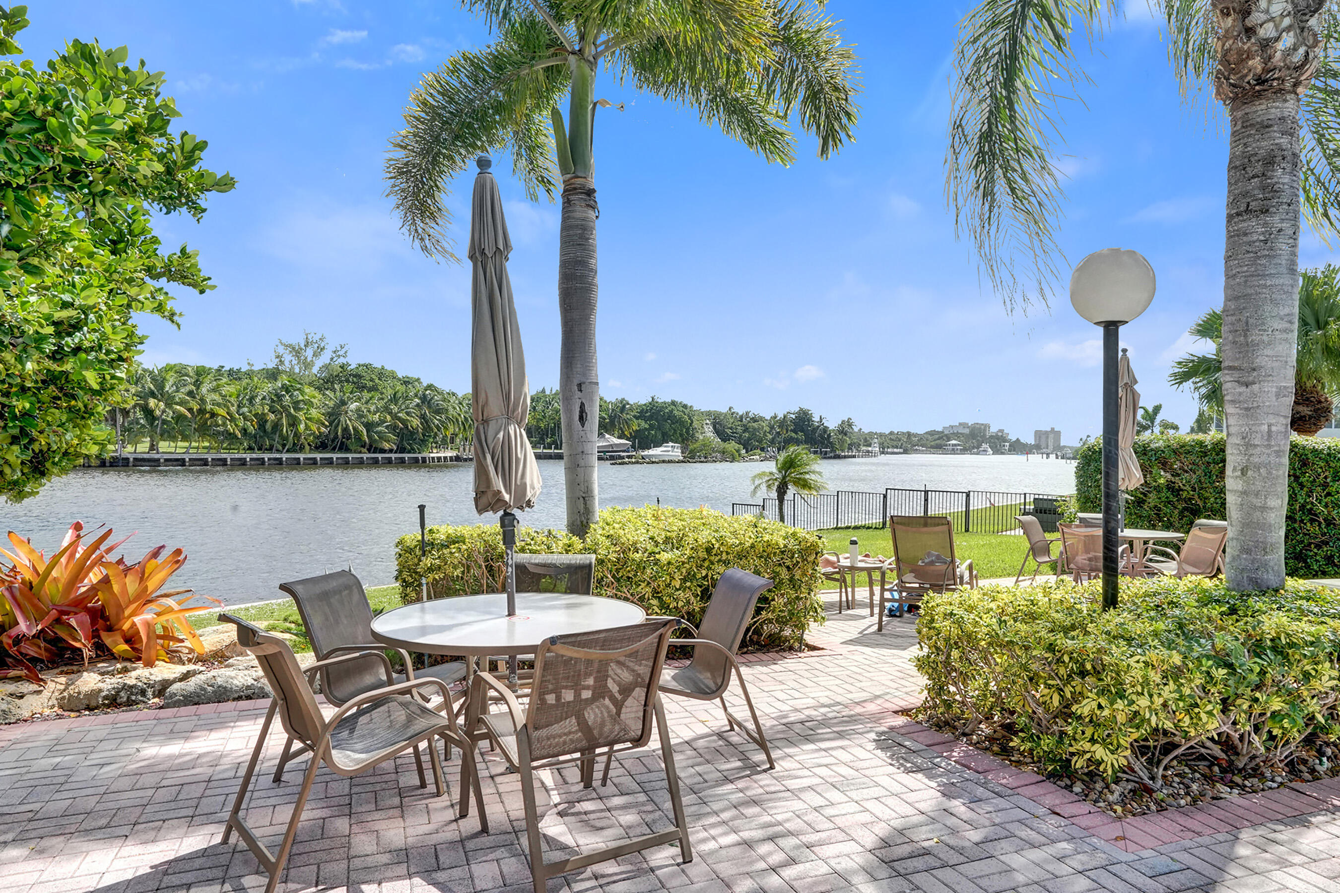 3145 Northeast 48th Court, Unit 215 Lighthouse Point, FL 33064 - Photo 32 of 46 ICW Grill and Pool Patio