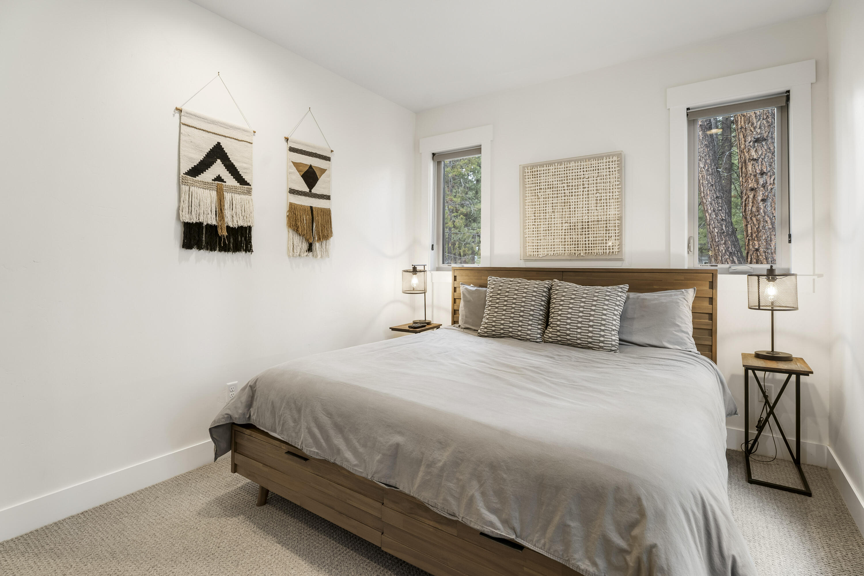 56302 Sable Rock Loop, Unit 255 Bend, OR 97707 - Photo 39 of 65 a bedroom with a bed and window
