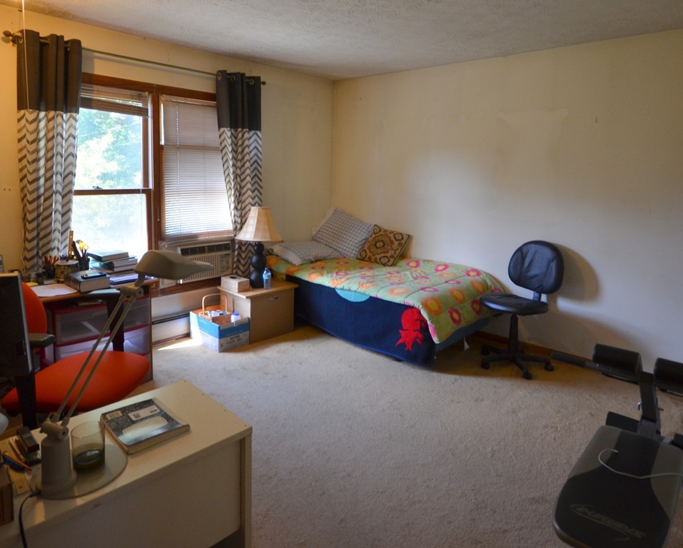 350 Warren Wright Road Belchertown, MA 01007 - Photo 21 of 30 a bedroom with furniture and windows