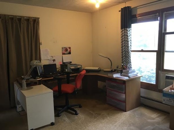 350 Warren Wright Road Belchertown, MA 01007 - Photo 22 of 30 a view of a workspace with furniture and a window