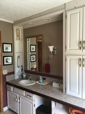 350 Warren Wright Road Belchertown, MA 01007 - Photo 23 of 30 a bathroom with a granite countertop sink and a mirror
