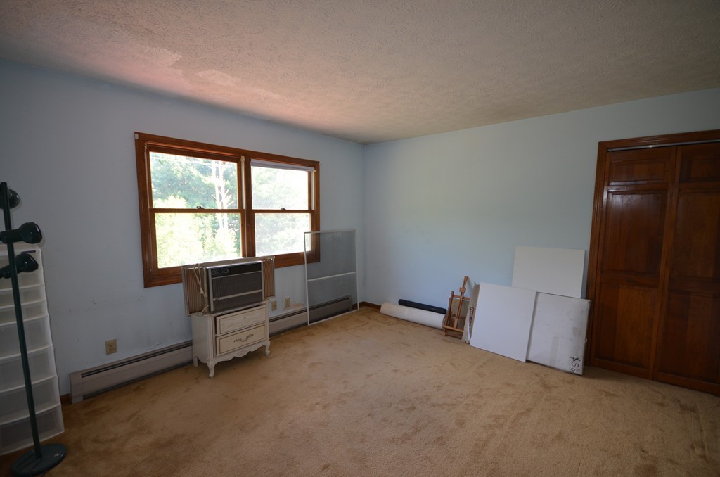 350 Warren Wright Road Belchertown, MA 01007 - Photo 24 of 30 an empty room with windows