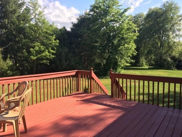 350 Warren Wright Road Belchertown, MA 01007 - Photo 26 of 30 a view of balcony with wooden floor and fence
