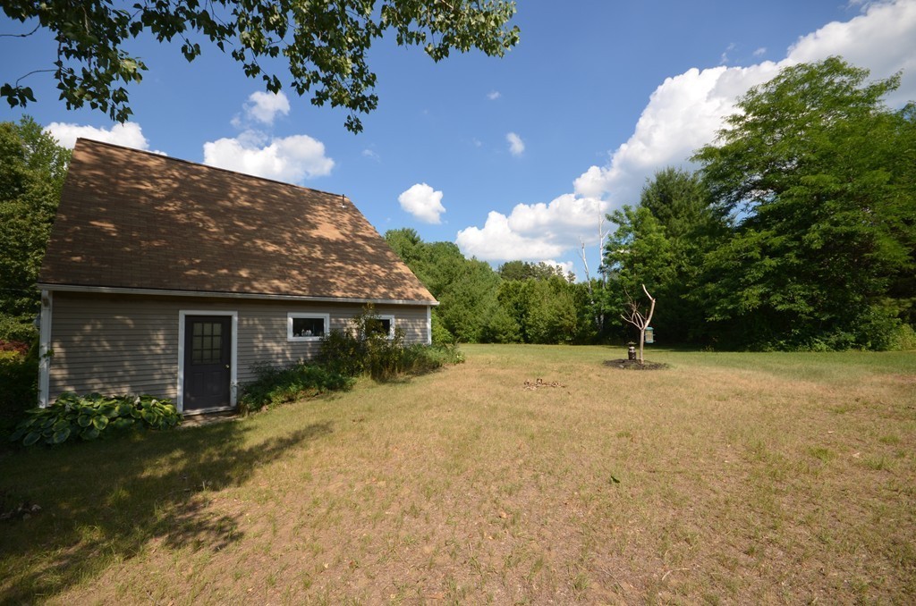 350 Warren Wright Road Belchertown, MA 01007 - Photo 28 of 30 a view of a house with a yard and tree