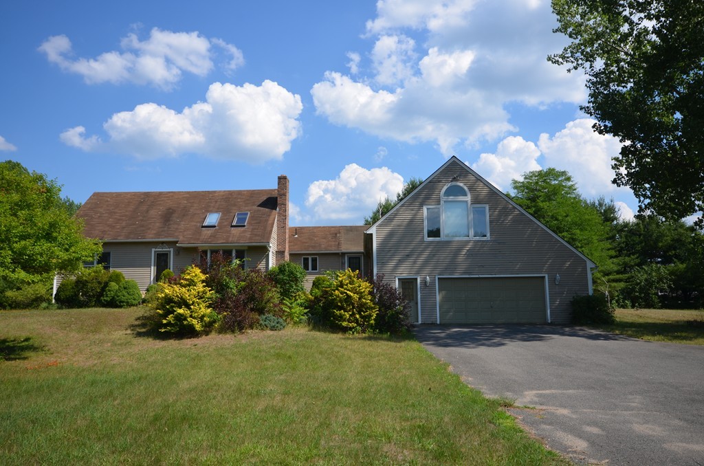 350 Warren Wright Road Belchertown, MA 01007 - Photo 30 of 30 a front view of a house with garden