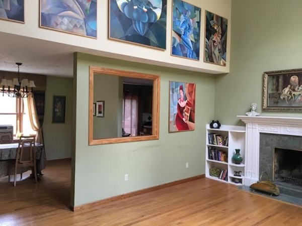 350 Warren Wright Road Belchertown, MA 01007 - Photo 3 of 30 a view of a livingroom with an empty space and a fireplace
