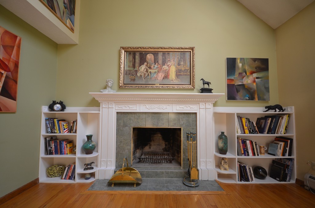 350 Warren Wright Road Belchertown, MA 01007 - Photo 4 of 30 a living room with furniture and a fireplace
