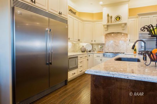430 West Javis Avenue Ridgecrest, CA 93555 - Photo 12 of 35 a kitchen with stainless steel appliances granite countertop a sink stove and refrigerator